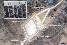 An aerial view of a GHF distribution site marking points of entry and basic operations
