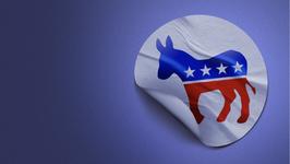 A photo illustration of a democratic donkey sticker peeling off a blue background
