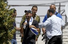 Elor Azaria, center, visits in the West Bank city of Hebron following his release from prison
